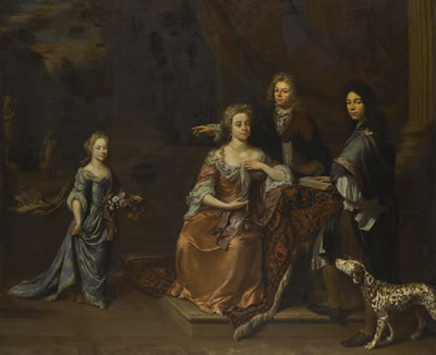 PORTRAIT OF A FAMILY IN A PARK LANDSCAPE, ATTENDED BY THEIR DALMATIAN