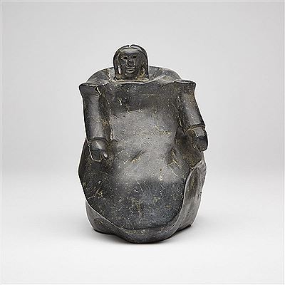 KNEELING WOMAN WITH BILLOWING AMAUTIQ