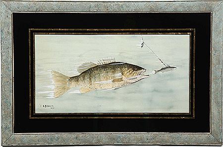 Small mouth bass chasing fishing lure