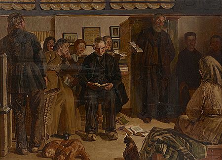 Company in an interior studying the Bible