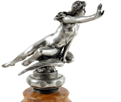 A RARE AND IMPRESSIVELY LARGE 'NUDE ON WINGED WHEEL' MASCOT