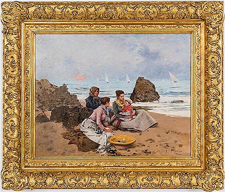Three women seated on a rocky beach