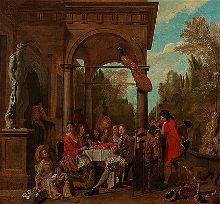 An elegant company having dinner on a terrace