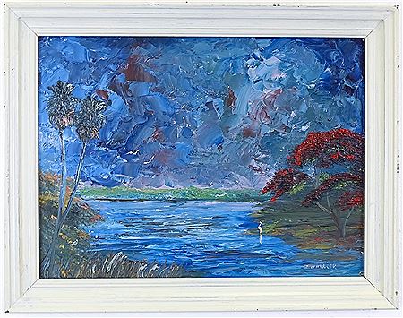 Natural Florida everglades or marsh scene with a Royal Poinciana and birds in the background