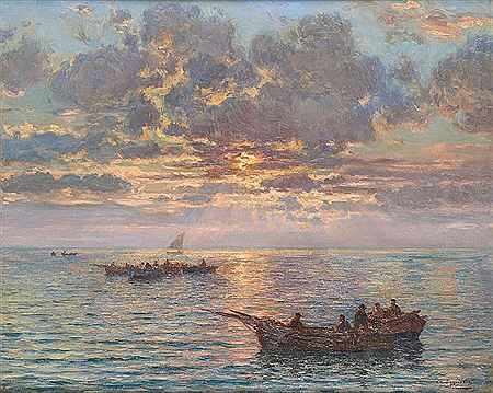 Coucher de soleil sur les barques de pêche
