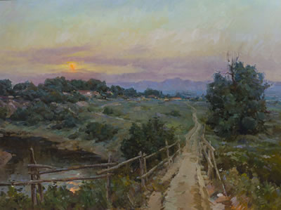 Sunrise over a hillside landscape