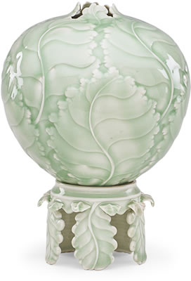 Fine celadon cabbage vase on leafy stand