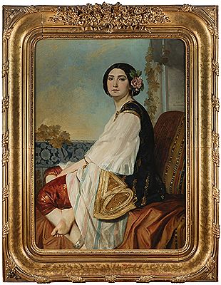 Femme vêtue à l’orientale dans un intérieur bourgeois