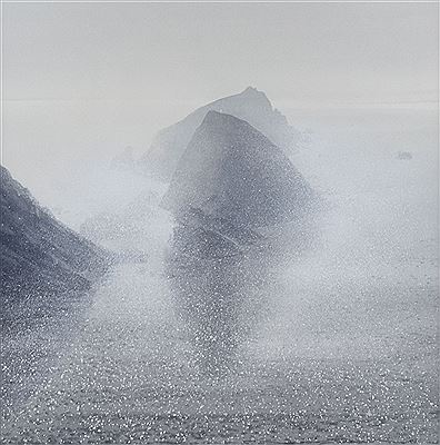 Coastal scene with sea mist