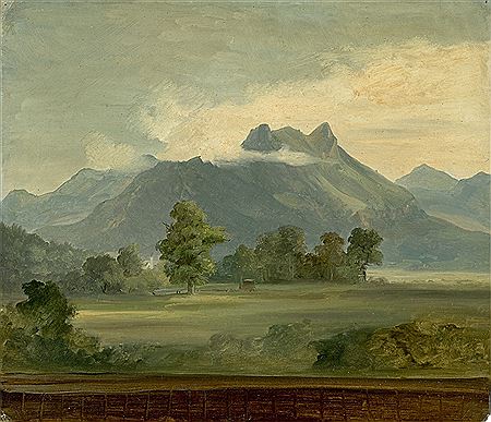 Wolken über einem Gebirge in Tirol
