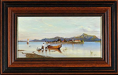 Fischer auf dem Chiemsee mit Blick auf die Fraueninsel