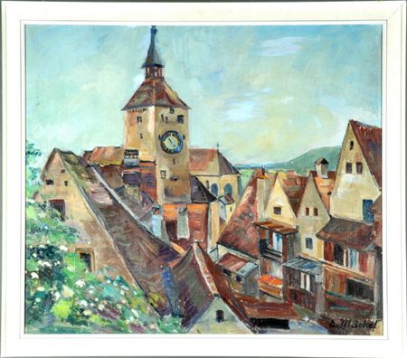 Blick über die Dächer einer Stadt mit Kirchturm