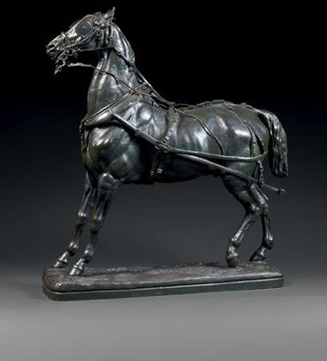 Cheval d'attelage harnaché.