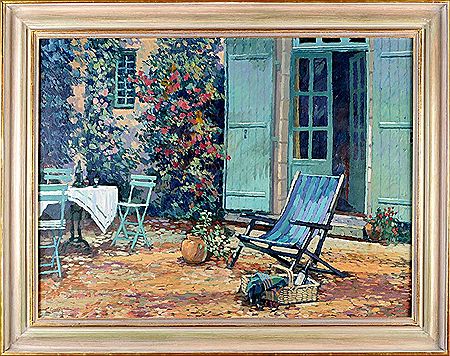 A SUMMER GARDEN WITH STRIPED DECK CHAIR