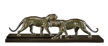 Two walking lioness