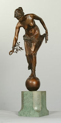 Bronze sculpture of female nude, bending from the waist, holding branch, standing on sphere