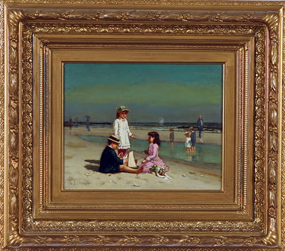 Three children playing along the beach