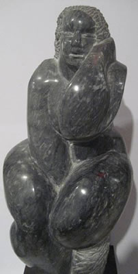 Figure of a seated woman