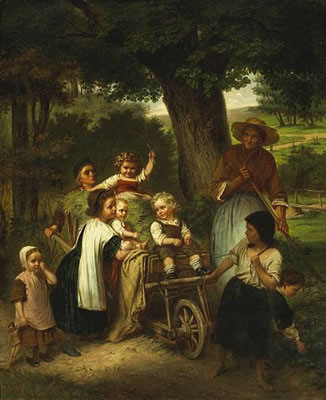 Children playing in a hay wagon