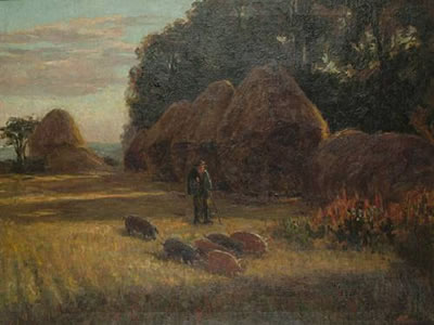 A farmer driving pigs through a field with hay ricks
