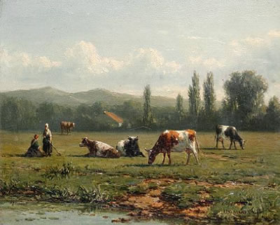 Cattle grazing by a stream