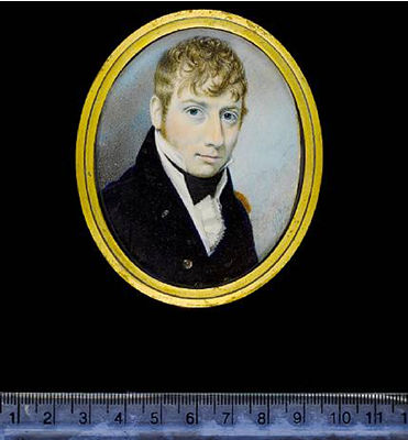 A Naval Officer, wearing blue coat with gold epaulette and brass buttons embossed with anchors over frilled white chemise and black stock