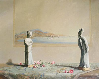 Oriental figurines on a table with painting behind