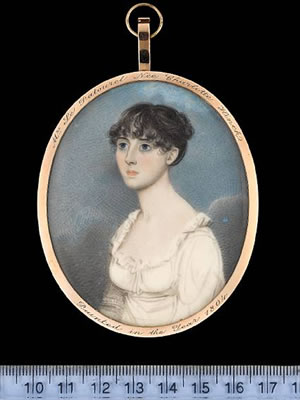 Charlotte Le Patourel (née Hinch), wearing white dress with frilled trim, her dark hair upswept
