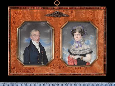 A pair of portraits of a Nobleman and a Lady: he, wearing blue overcoat with gold buttons, black coat, white waistcoat and stock held with jewelled stickpin, the badge of the Imperial Austrian Order of Leopold on his left breast; she, wearing black dress