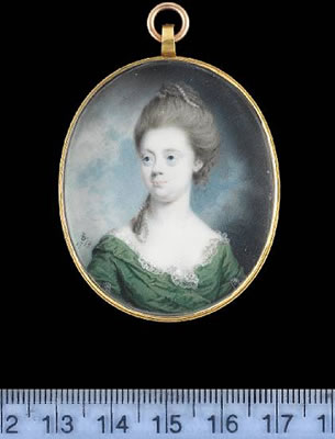 A Lady, wearing leaf green dress over lace-trimmed white shift, silver clips at her upper arms and strand of pearls in her upswept powdered hair.