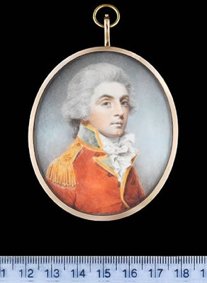 An Officer, wearing scarlet coat with gold edged green facings and gold epaulette, his powdered wig worn en queue.