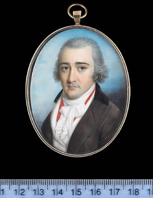 A Gentleman, wearing brown coat with black collar, white waistcoat, frilled chemise, red solitaire and tied cravat, his hair powdered.