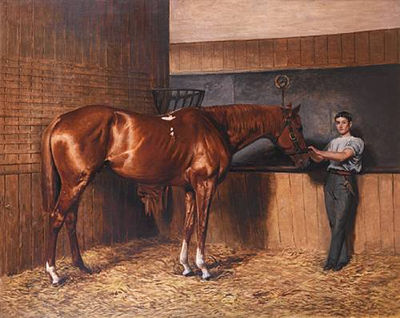 'Avontes' and groom in a stable interior