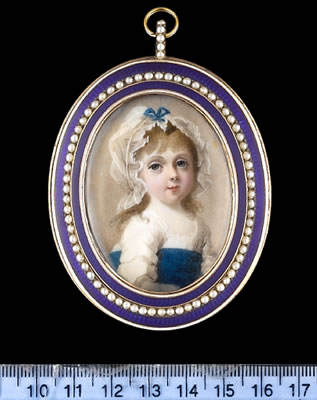 A child, traditionally called Princess Charlotte Augusta, wearing white dress with wide blue sash and frilled white bonnet tied with blue ribbon bow.