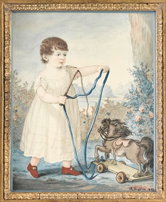 Princess Charlotte Augusta (1796-1817), standing in a garden, playing with a toy horse on wheels, wearing white dress and red buckled shoes, she holds the blue cord of the base of the toy in both hands, a horse whip in her right hand.