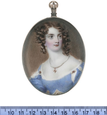 A Lady, wearing décolleté blue dress, slashed at the shoulders to reveal white, pearls and rubies at her waist and shoulders