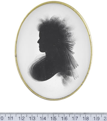 A silhouette of Frances Yate, profile to the left, wearing fichu, her hair worn à la Conseilleur tied with a large ribbon bow