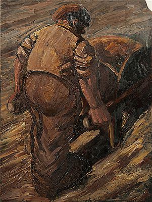 Man pushing a wheelbarrow