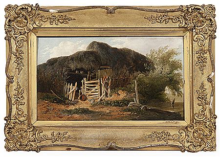 A tumbledown shed by a stream