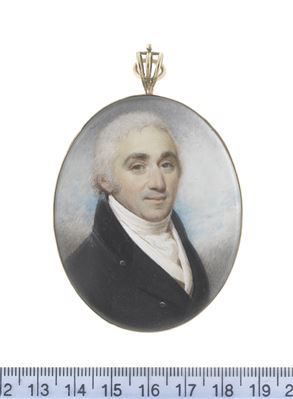 A Gentleman wearing a black coat