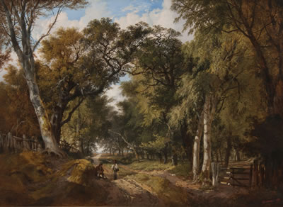 A wooded landscape with figures resting on a track