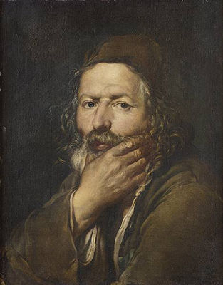 An elderly bearded peasant man resting his chin in his hand
