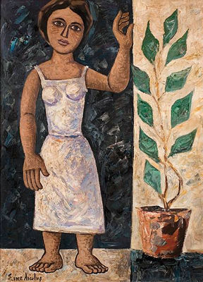 Girl standing next to a plant
