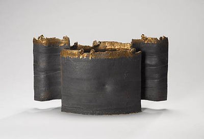 A flattened Vessel with 'Wings'