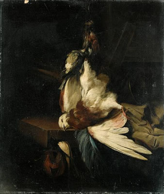 A hanging pigeon, a finch and a swallow, with hunting paraphernalia on a table top