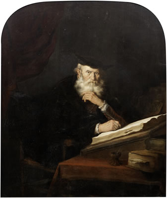 A philosopher seated at his desk
