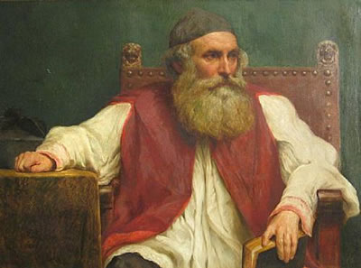 A portrait of a rabbi holding a book