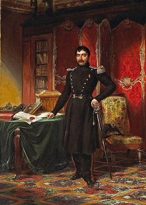 A military officer in his study with documents and books on a table