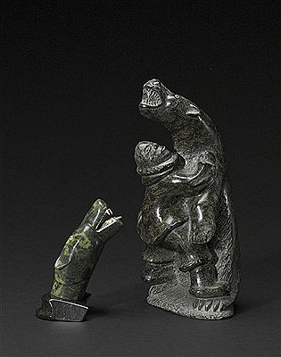 Hunter an Bear with a bear bust