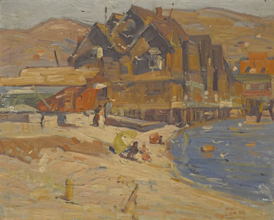 Figures on the sand under beach umbrellas with shore buildings beyond